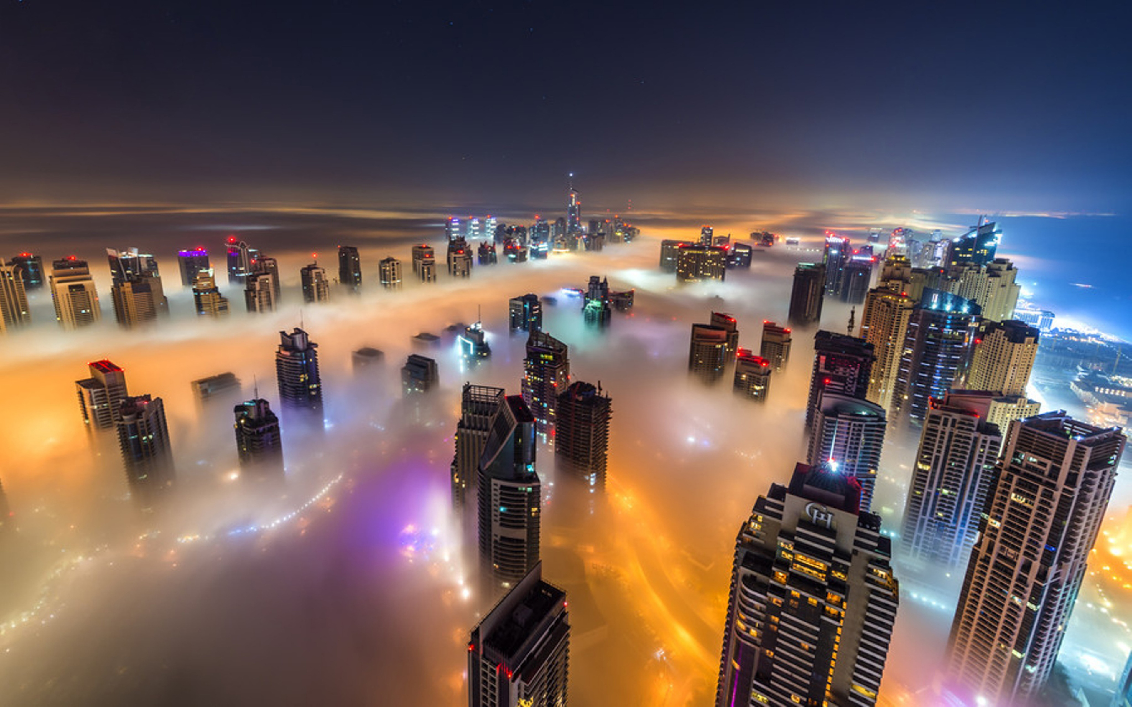 Dubai Night Time City In The Fog Hd Wallpaper : Wallpapers13.com
