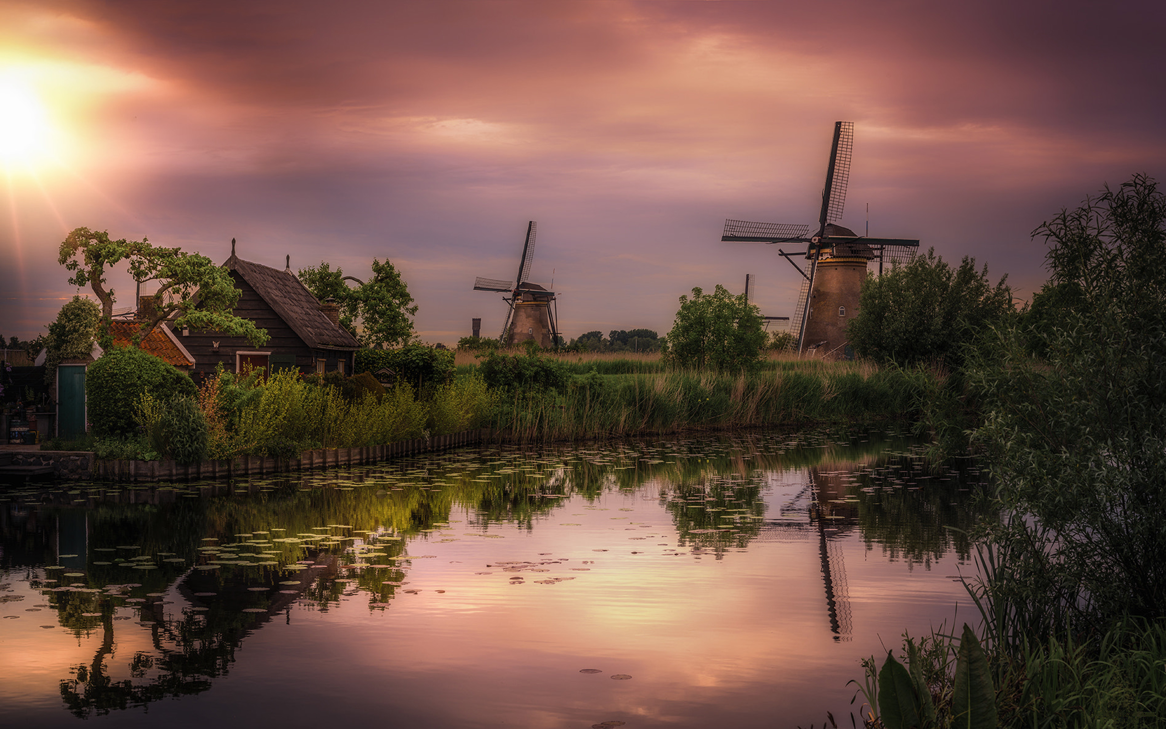Windmills At Kinderdijk In The Province Of South Holland Netherlands Sunset Dusk Channel 
